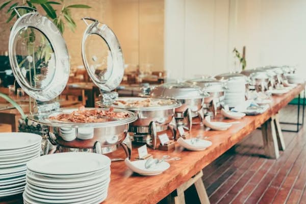 Table with catering pots and plates