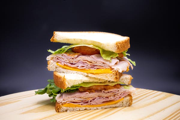 Deli club on a wood block