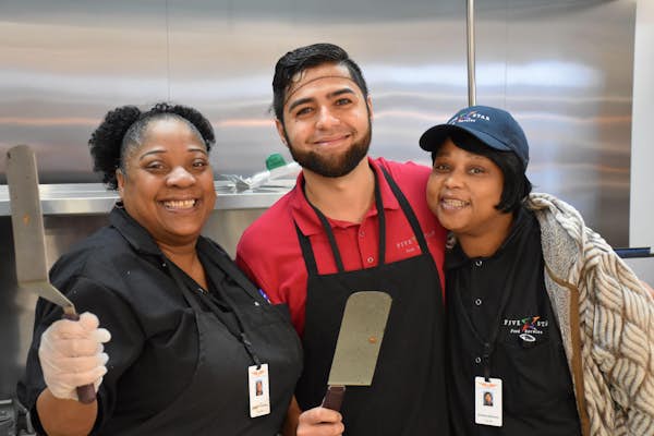 Three Five Star Food Service employees