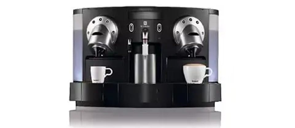 Nespresso Gemini machine making two cups of coffee