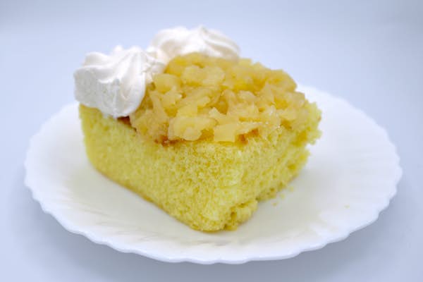 Pineapple delight cake on a plate